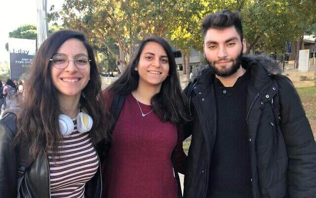 Luna Karayanni, a 20-year-old second-year computer sciences student at the Technion, left, together with Mais Haddad, her 20-year old friend, who studies bio-medical engineering, and Sabri Asssaf, a 20-year-old bioengineering student, at the Technion campus in Haifa’ December 19, 2019. (Shoshanna Solomon/Times of Israel)